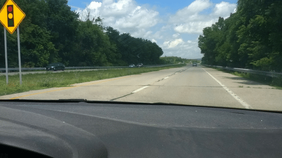 Car driving down the road.